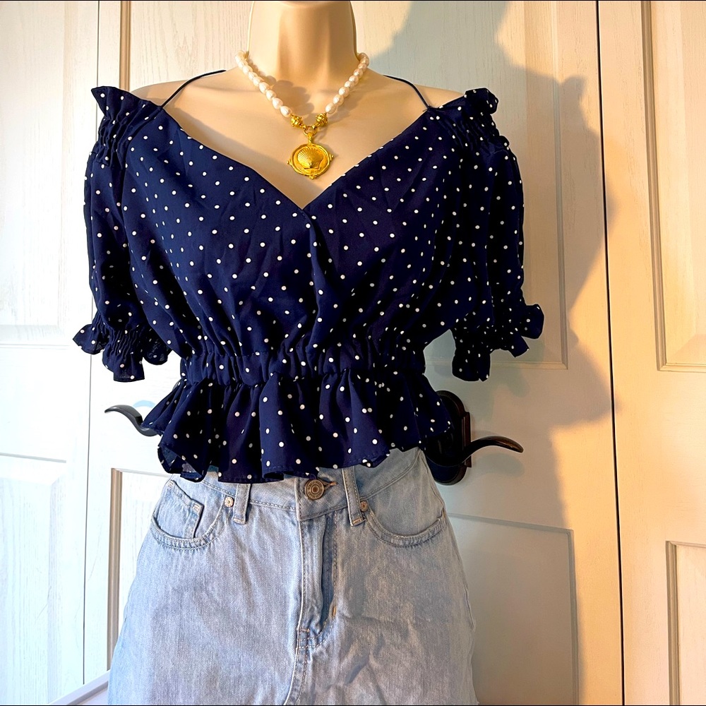 Brand new with tag raffled off shoulder blouse